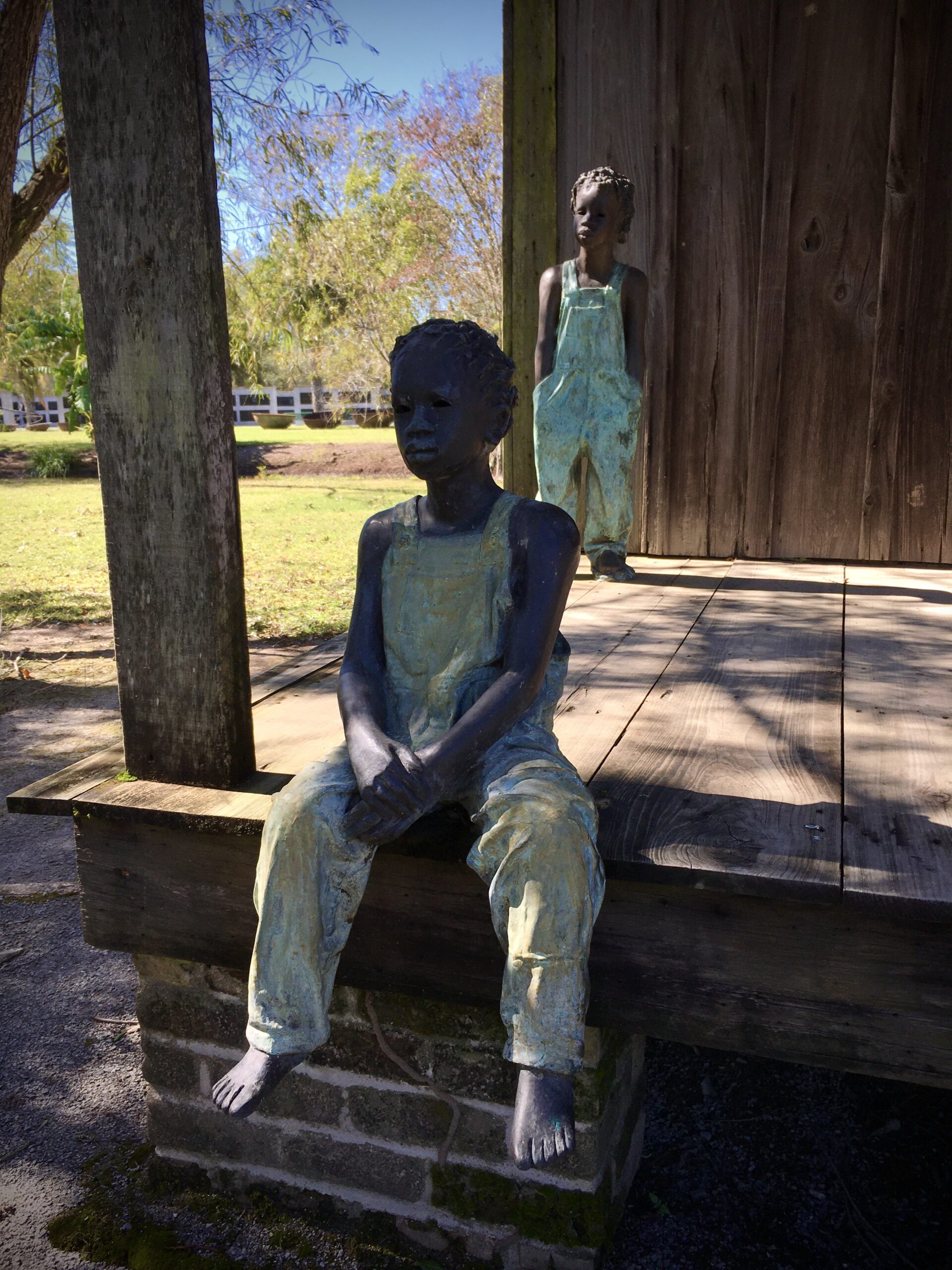 WHITNEY Sitting Statue Ext.